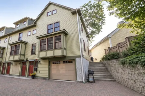 a view of a house with a garage