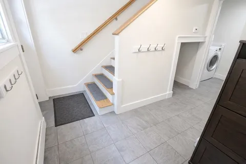 a view of an entryway with staircase