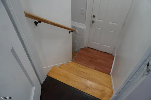 a bedroom with a bed and a shower