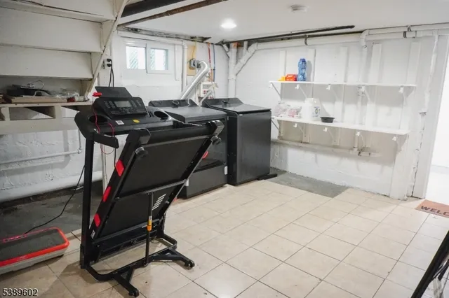 a bedroom with a bed a desk and chair