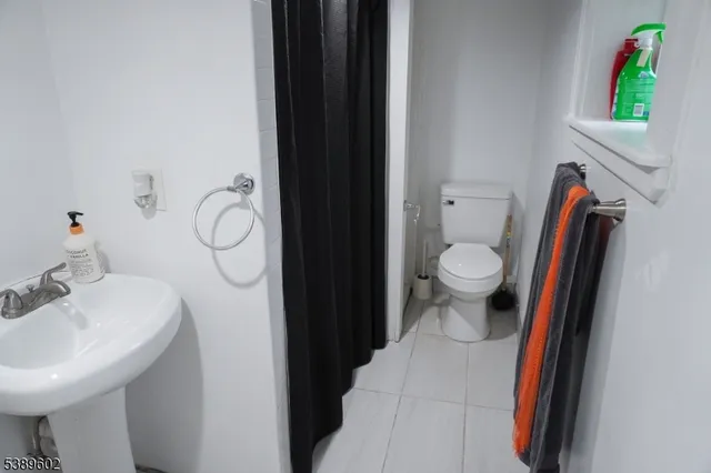 a bathroom with a sink and a toilet
