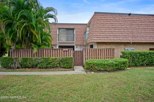 a view of a house with a garden