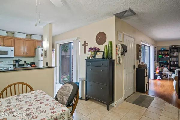 a bedroom with a bed and cabinets
