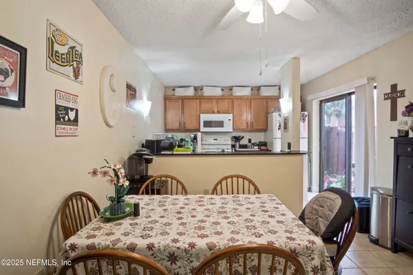a view of a dining room with furniture