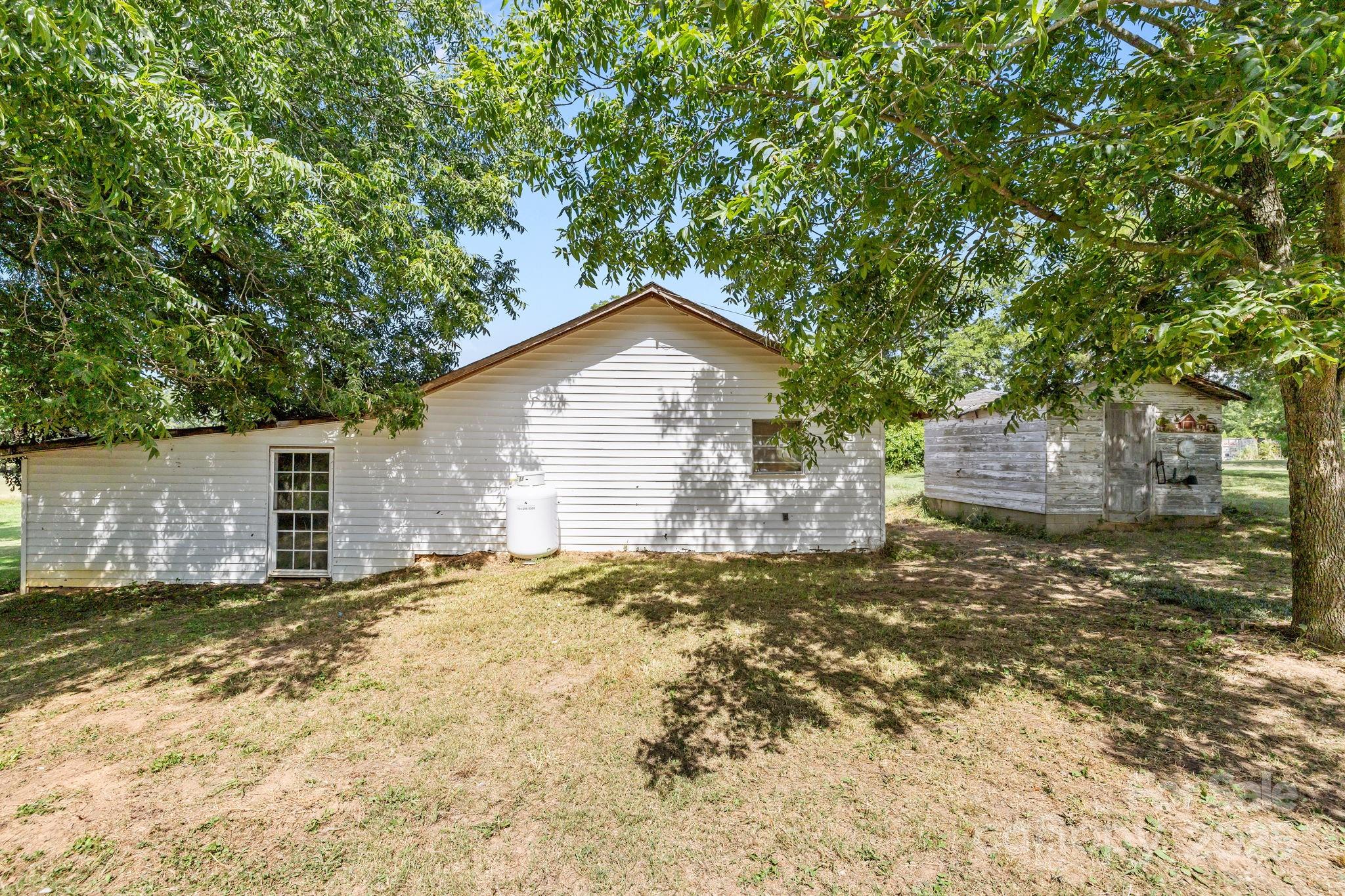 3825 Stack Road Monroe, NC 28112 - Photo 11 of 20 a view of a house with a yard
