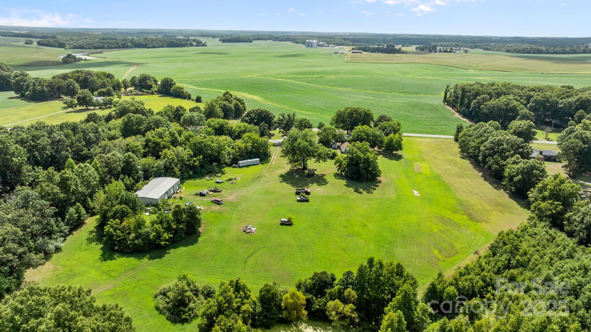 3825 Stack Road Monroe, NC 28112 - Photo 5 of 20 a view of a lake with a mountain