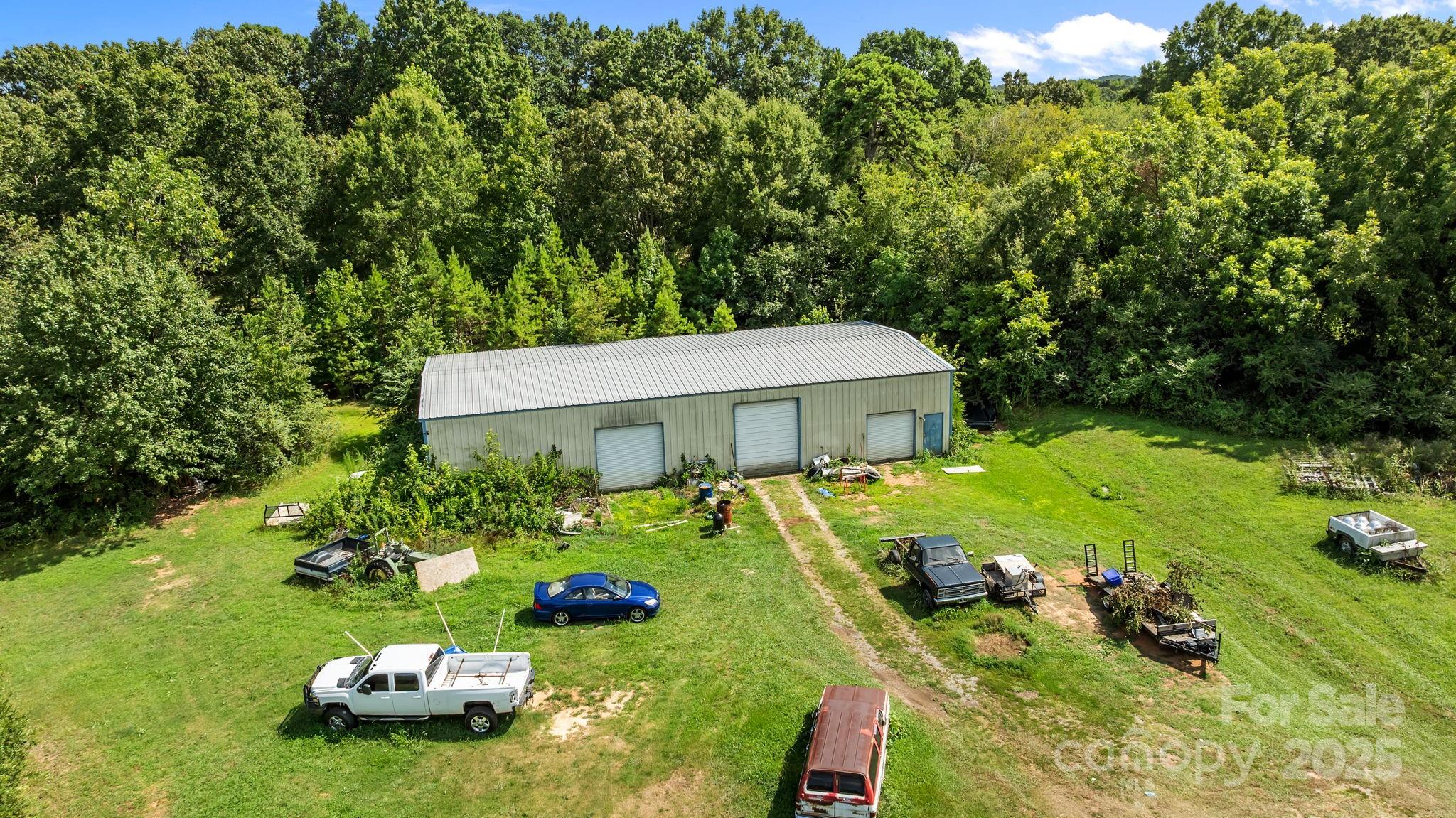 3825 Stack Road Monroe, NC 28112 - Photo 8 of 20 a view of a swimming pool and lounge chair