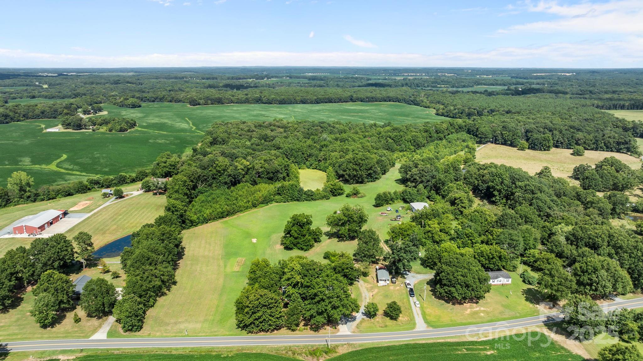 3825 Stack Road Monroe, NC 28112 - Photo 9 of 20 a view of a lush green space
