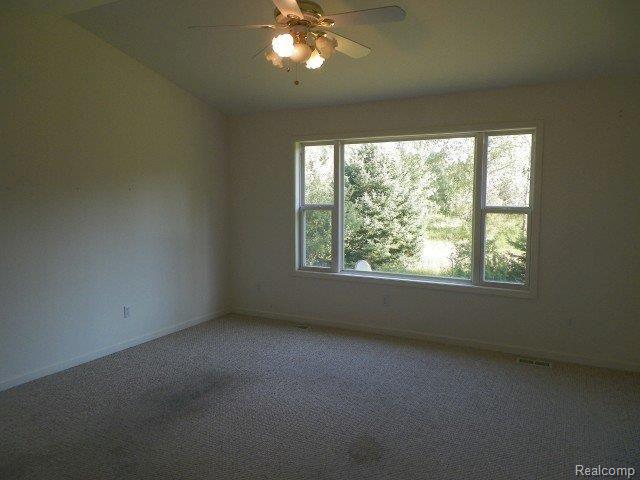 335 West Castle Road Fostoria, MI 48435 - Photo 6 of 28 262-132341 - Living Room.JPG