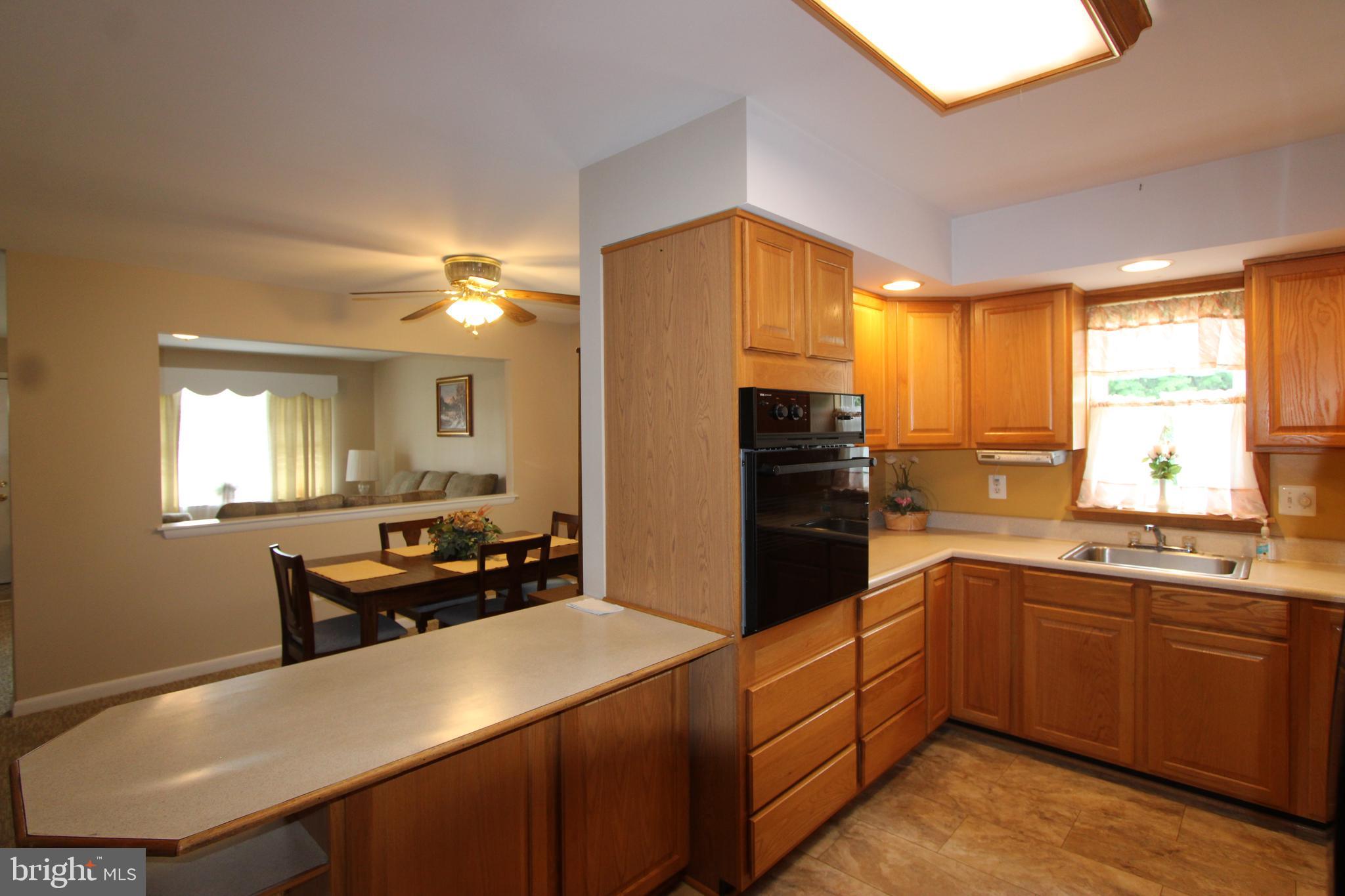 1604 Cape May Road Baltimore, MD 21221 - Photo 4 of 30 a kitchen with a sink appliances and cabinets