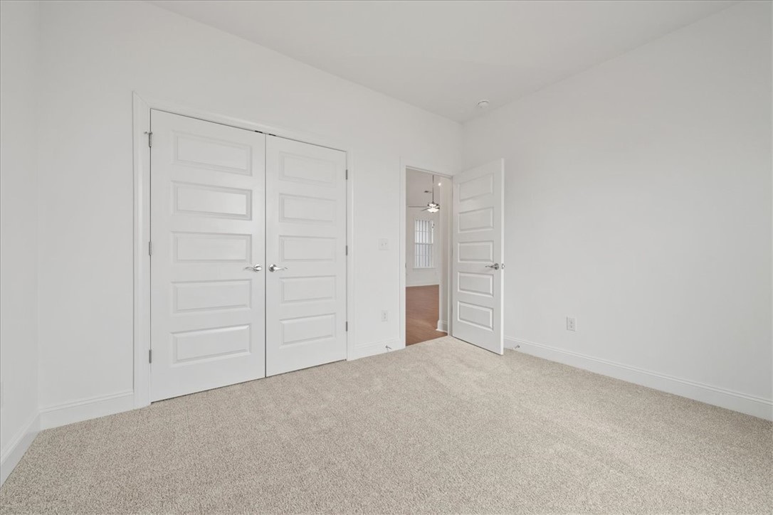 108 Oak Grove Road Norris, SC 29667 - Photo 16 of 35 This bright room features soft carpeting, providing a comfortable and inviting atmosphere.
