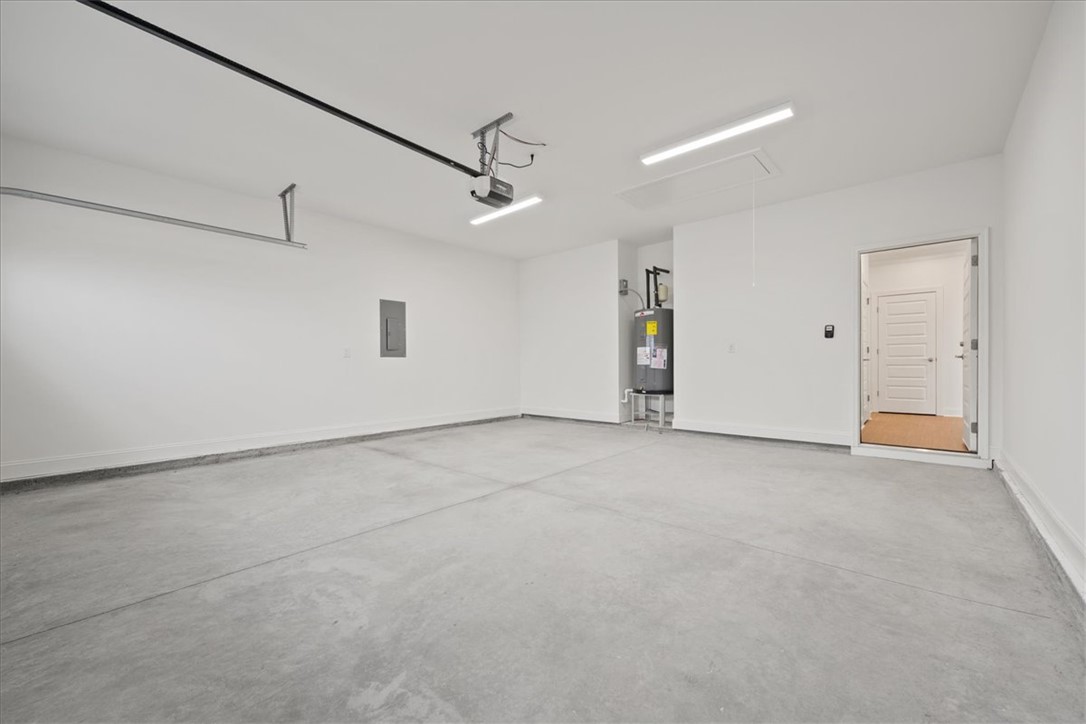108 Oak Grove Road Norris, SC 29667 - Photo 21 of 35 This spacious garage offers ample room for vehicles and storage, with convenient interior access.