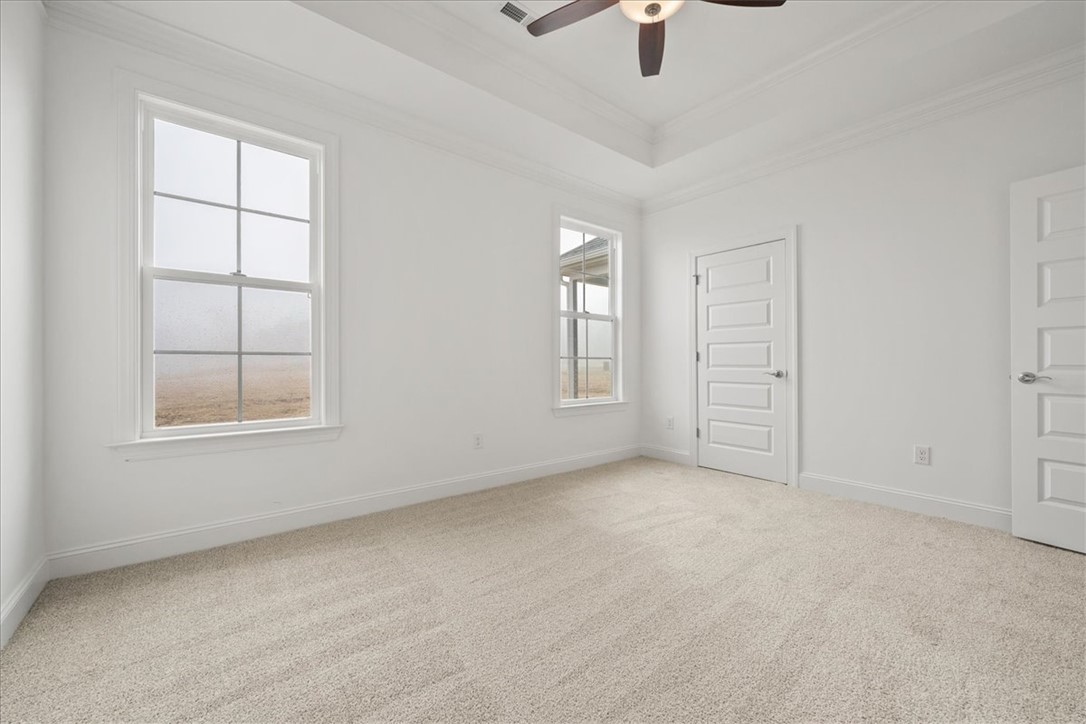 108 Oak Grove Road Norris, SC 29667 - Photo 24 of 35 This spacious bedroom offers serene views and a comfortable atmosphere for relaxation.