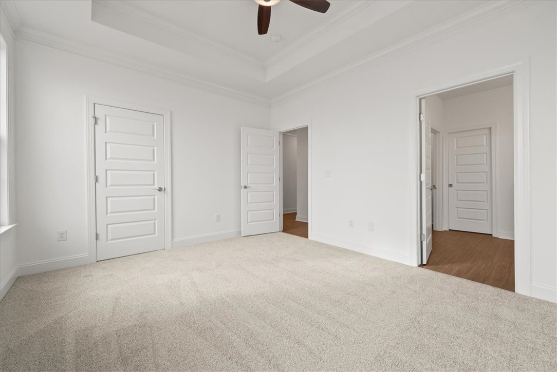 108 Oak Grove Road Norris, SC 29667 - Photo 25 of 35 This bright and airy room offers a tranquil retreat with plush carpeting and elegant crown molding.