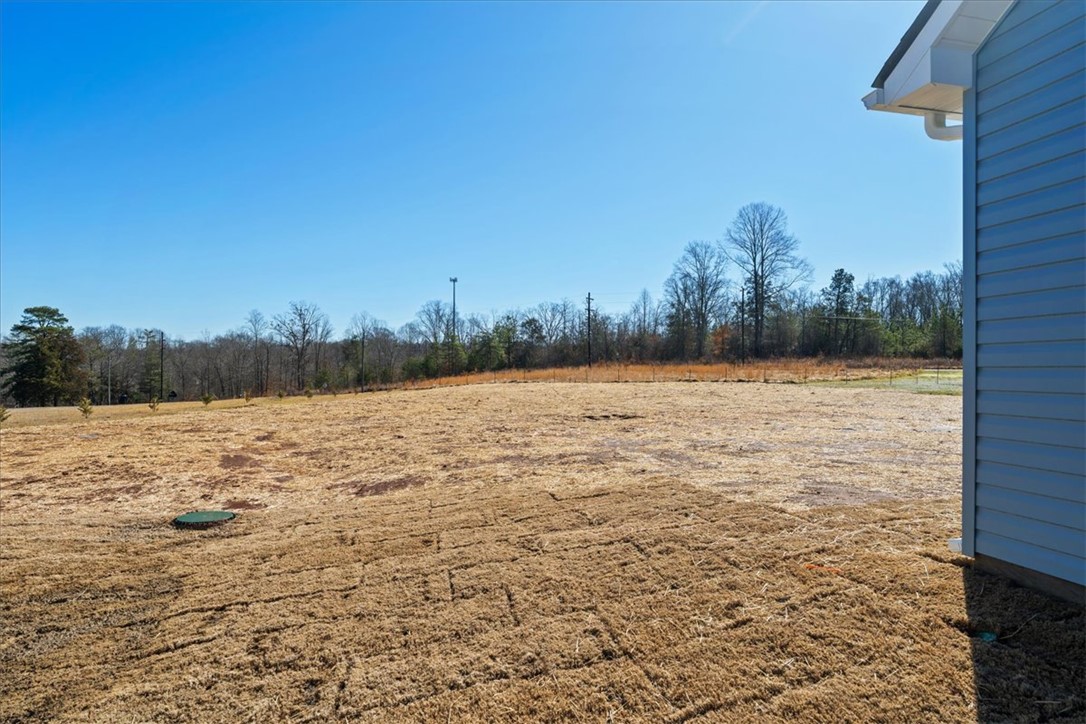 108 Oak Grove Road Norris, SC 29667 - Photo 32 of 35 Expansive outdoor space offering a blank canvas for landscaping and outdoor living.