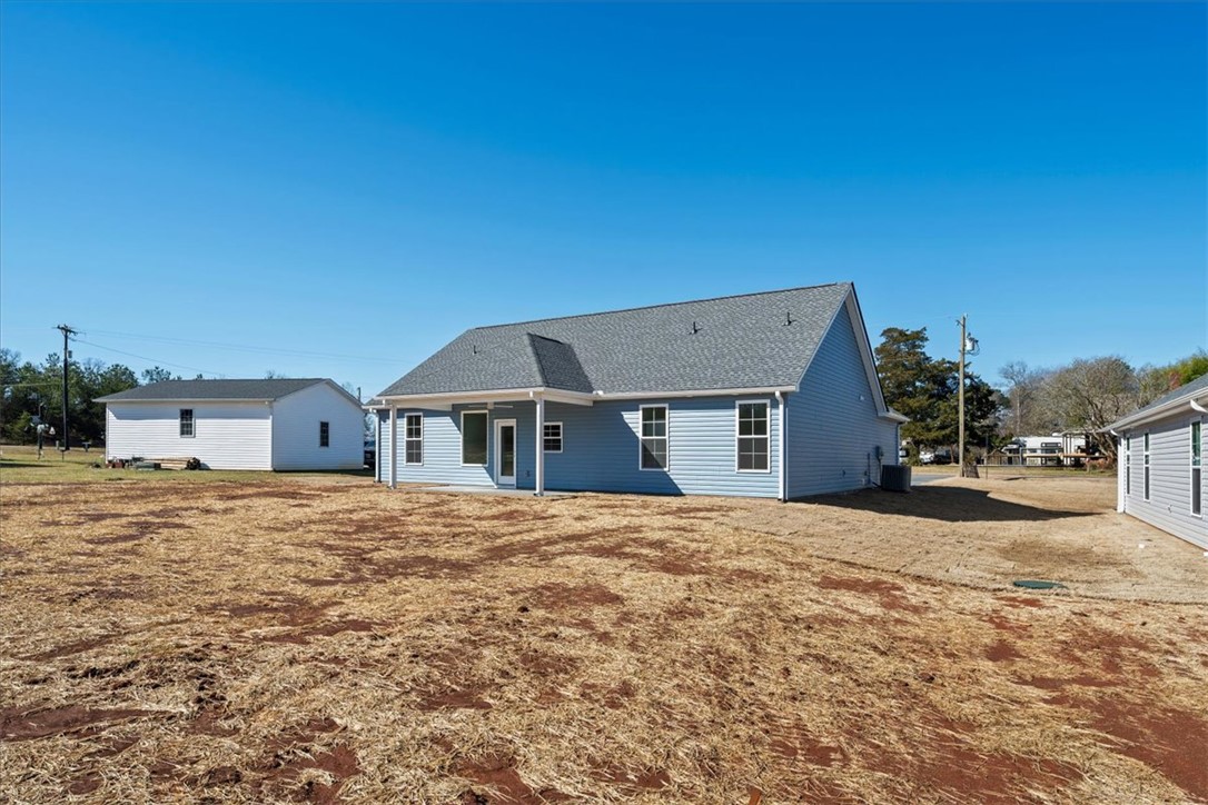108 Oak Grove Road Norris, SC 29667 - Photo 33 of 35 This newly constructed home features a crisp exterior and spacious surroundings, perfect for outdoor living.