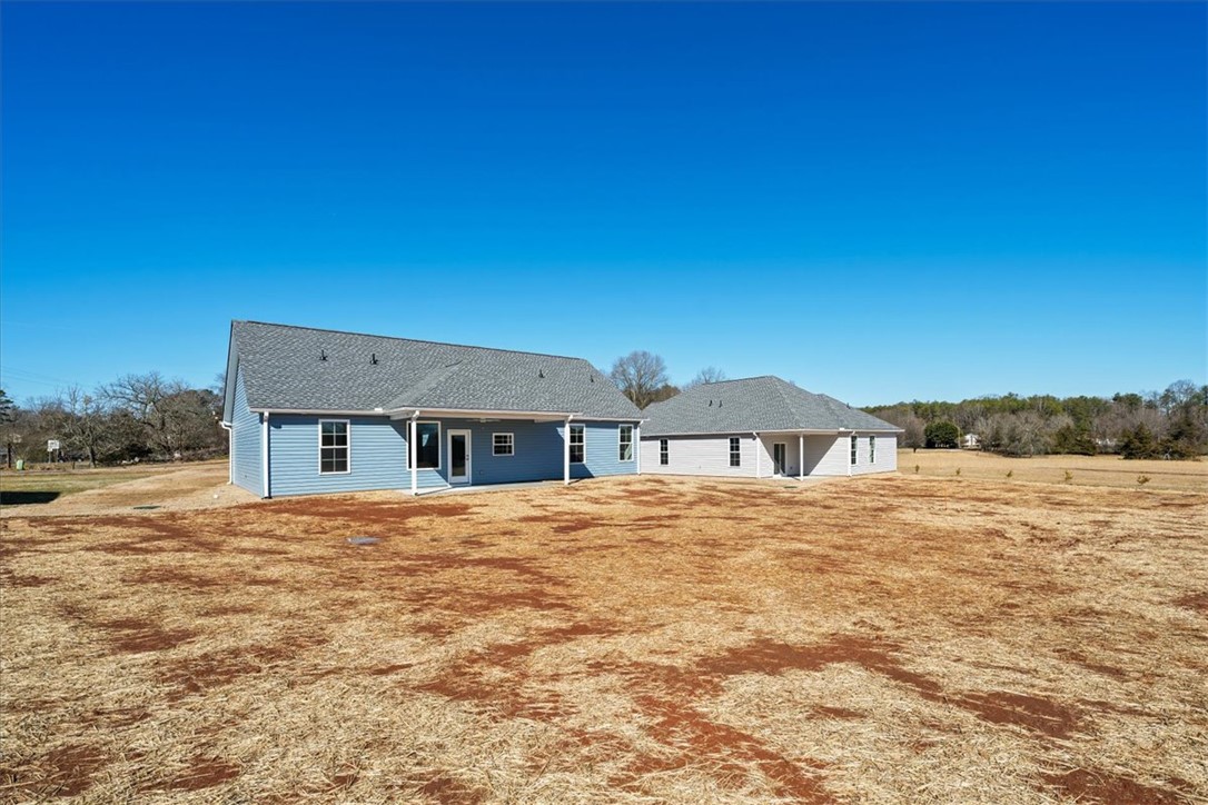 108 Oak Grove Road Norris, SC 29667 - Photo 34 of 35 This newly constructed home features a classic architectural style, offering ample space and serene rural views.