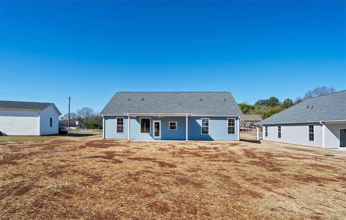 108 Oak Grove Road Norris, SC 29667 - Photo 35 of 35 This newly constructed home showcases a durable shingle roof and a spacious private yard.