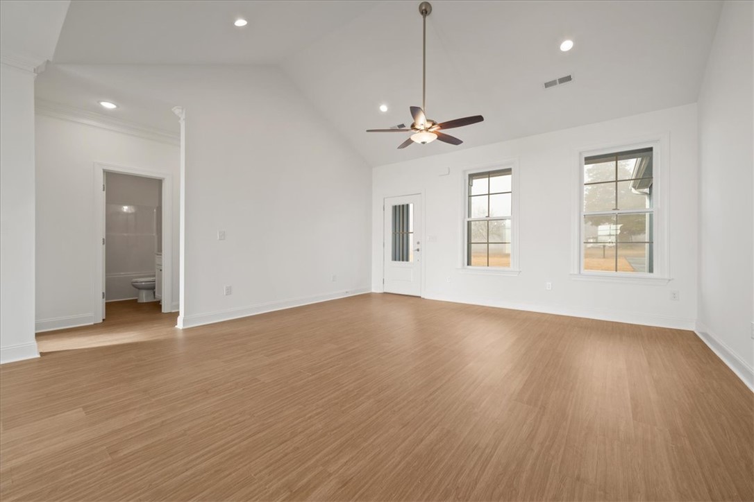 108 Oak Grove Road Norris, SC 29667 - Photo 5 of 35 This airy living space features vaulted ceilings and ample natural light from large windows.