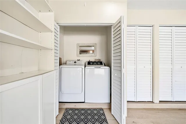 a utility room with a window washer and dryer