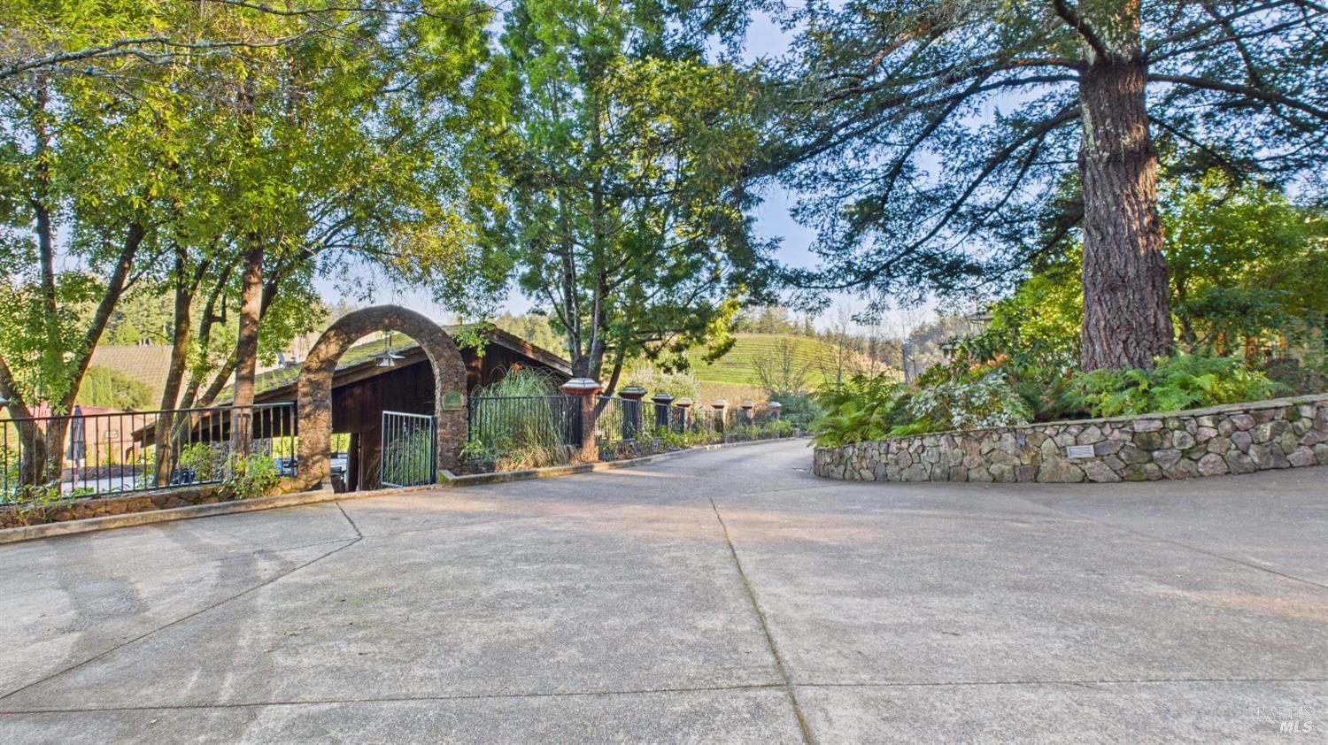 3225 West Dry Creek Road Healdsburg, CA 95448 - Photo 12 of 45 a view of road with large trees