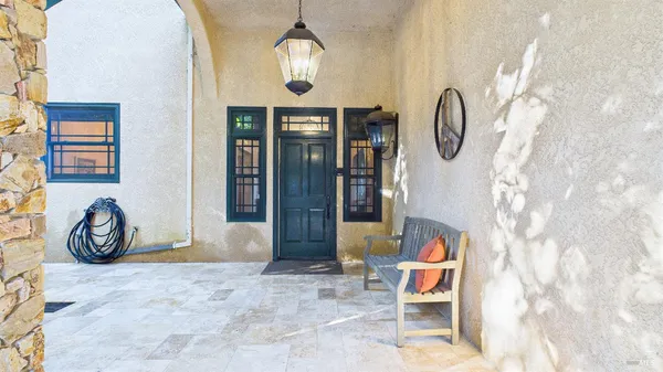 a view of a door and chair in the room