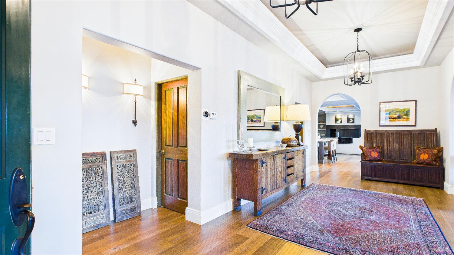 3225 West Dry Creek Road Healdsburg, CA 95448 - Photo 16 of 45 a large living room with stainless steel appliances granite countertop furniture and a rug
