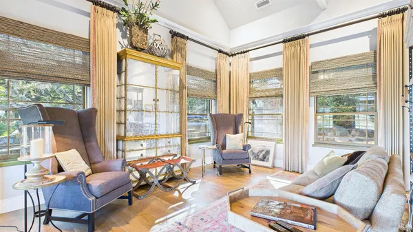 a bedroom with a bed and a table