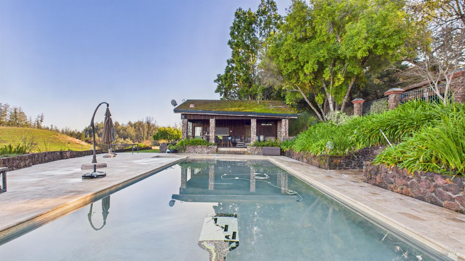 3225 West Dry Creek Road Healdsburg, CA 95448 - Photo 2 of 45 swimming pool view with a seating space