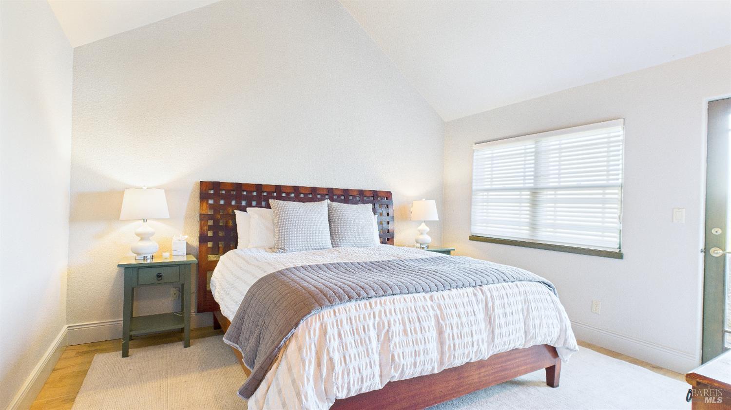 3225 West Dry Creek Road Healdsburg, CA 95448 - Photo 22 of 45 a bedroom with a bed and a night stand