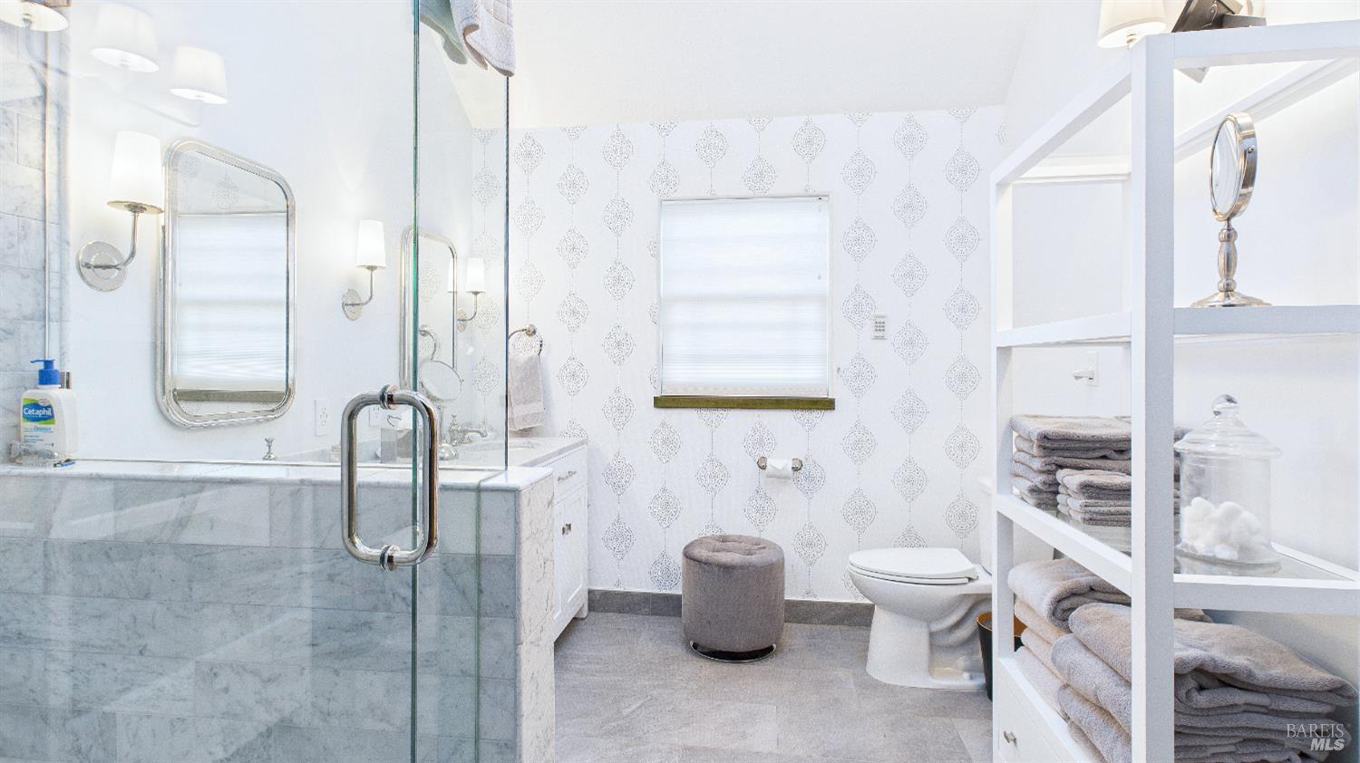 3225 West Dry Creek Road Healdsburg, CA 95448 - Photo 24 of 45 a bathroom with a granite countertop sink a toilet and a shower
