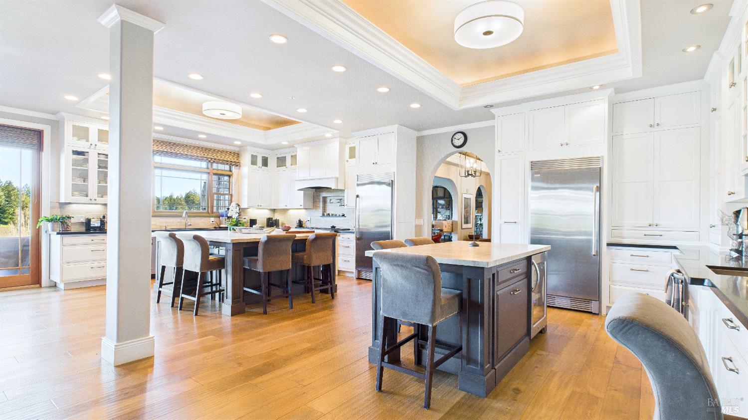 3225 West Dry Creek Road Healdsburg, CA 95448 - Photo 36 of 45 a large kitchen with a table and chairs