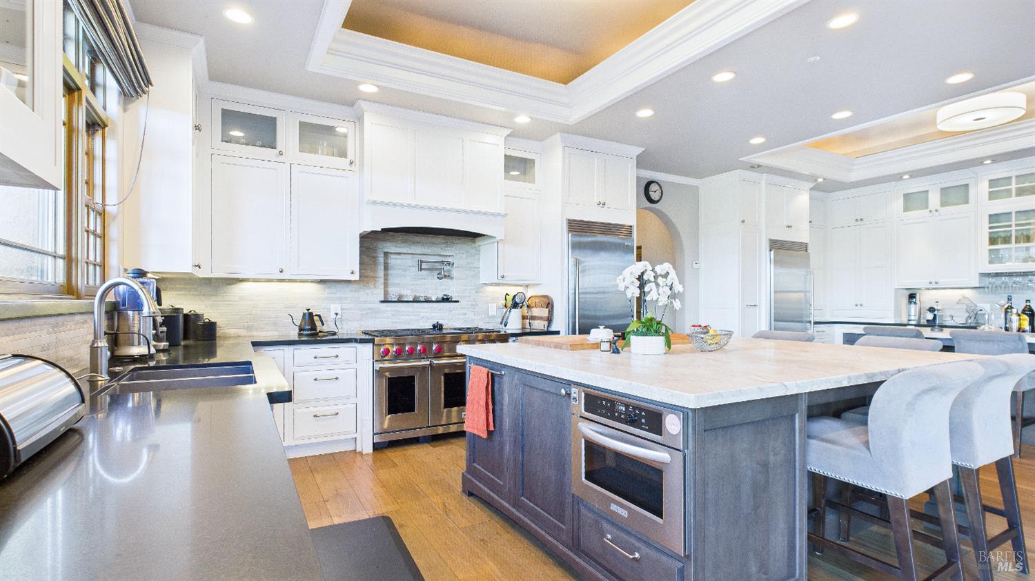 3225 West Dry Creek Road Healdsburg, CA 95448 - Photo 39 of 45 a kitchen with a stove a sink and a refrigerator