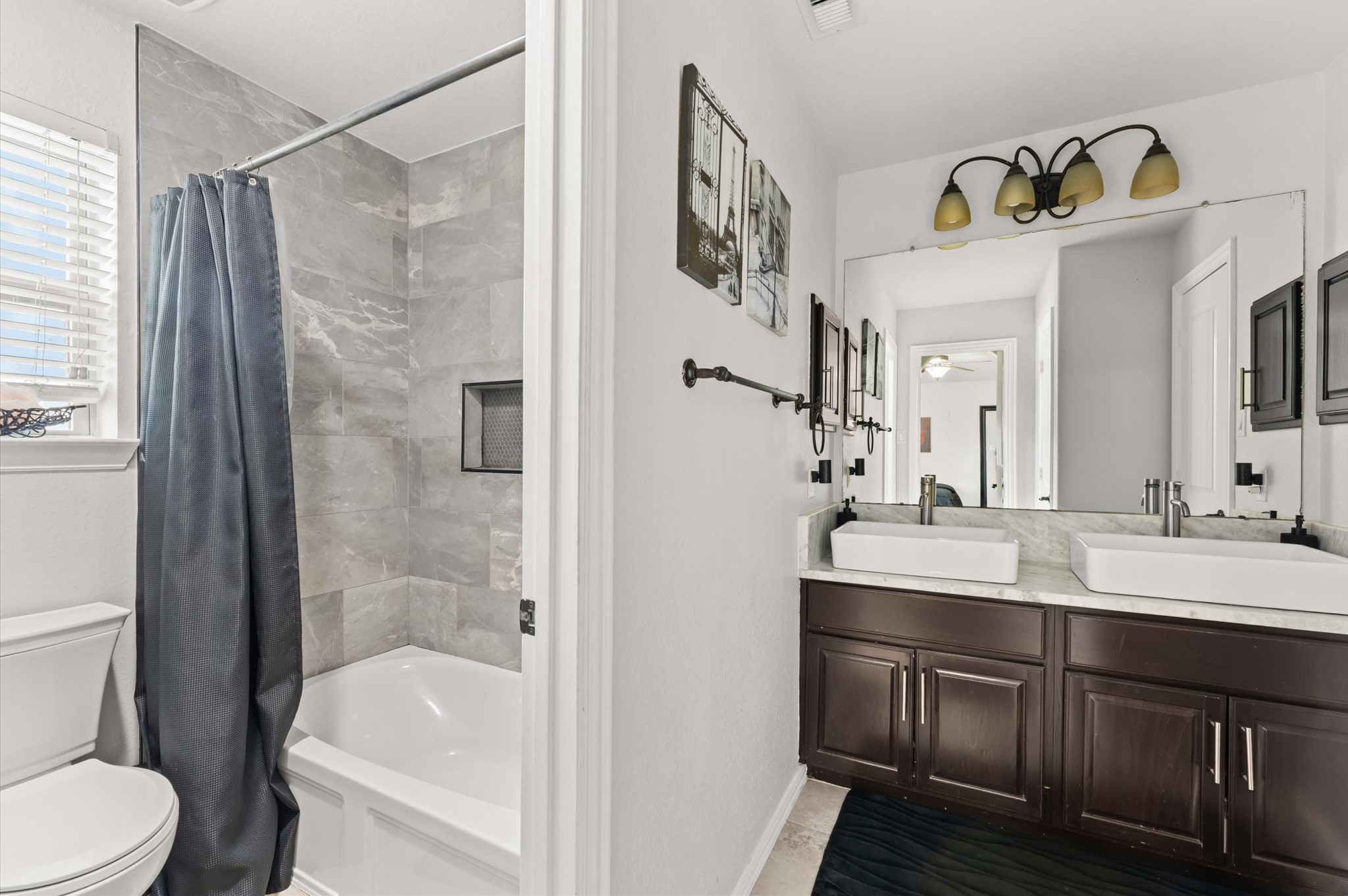14016 Savannah Landing Lane Rosharon, TX 77583 - Photo 33 of 49 a bathroom with a sink a toilet and a bathtub