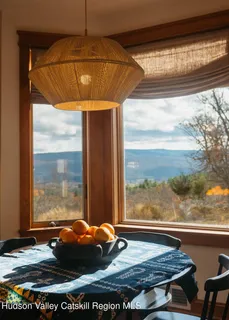 a view of a living room with furniture