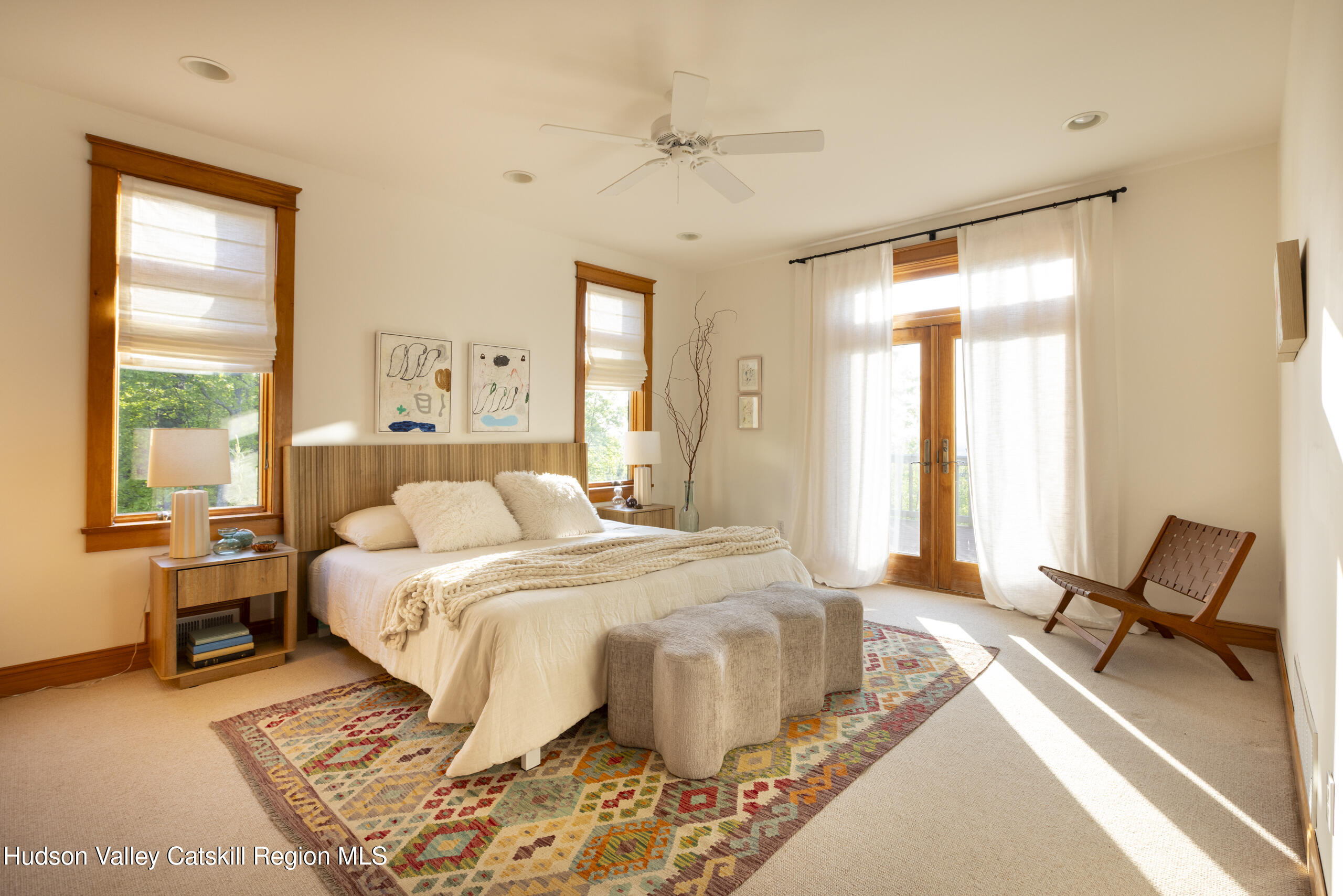 56 Woodland Ridge Road Kerhonkson, NY 12446 - Photo 21 of 31 a bedroom with a bed and wooden floor