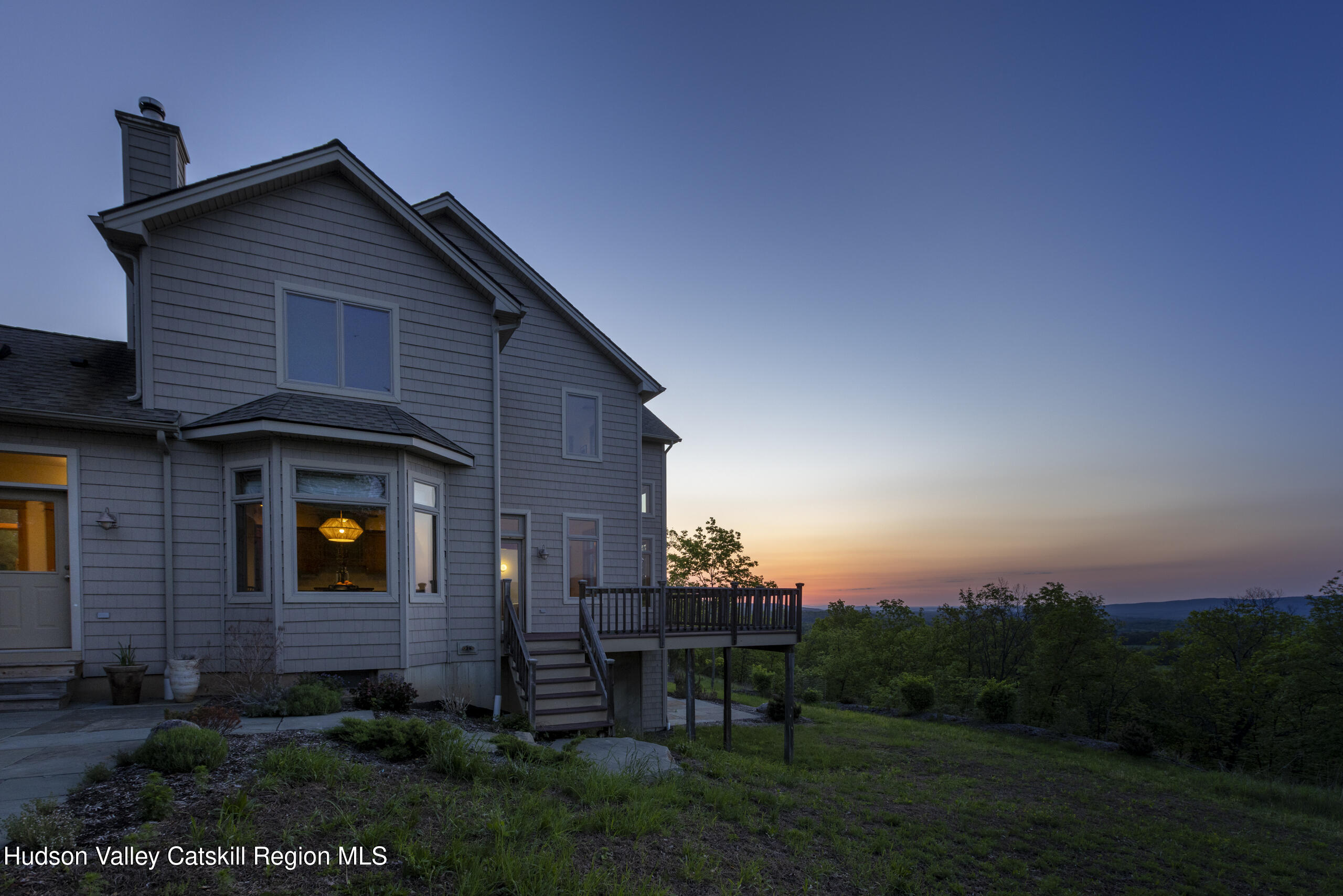 56 Woodland Ridge Road Kerhonkson, NY 12446 - Photo 30 of 31 a view of brick house with a small yard