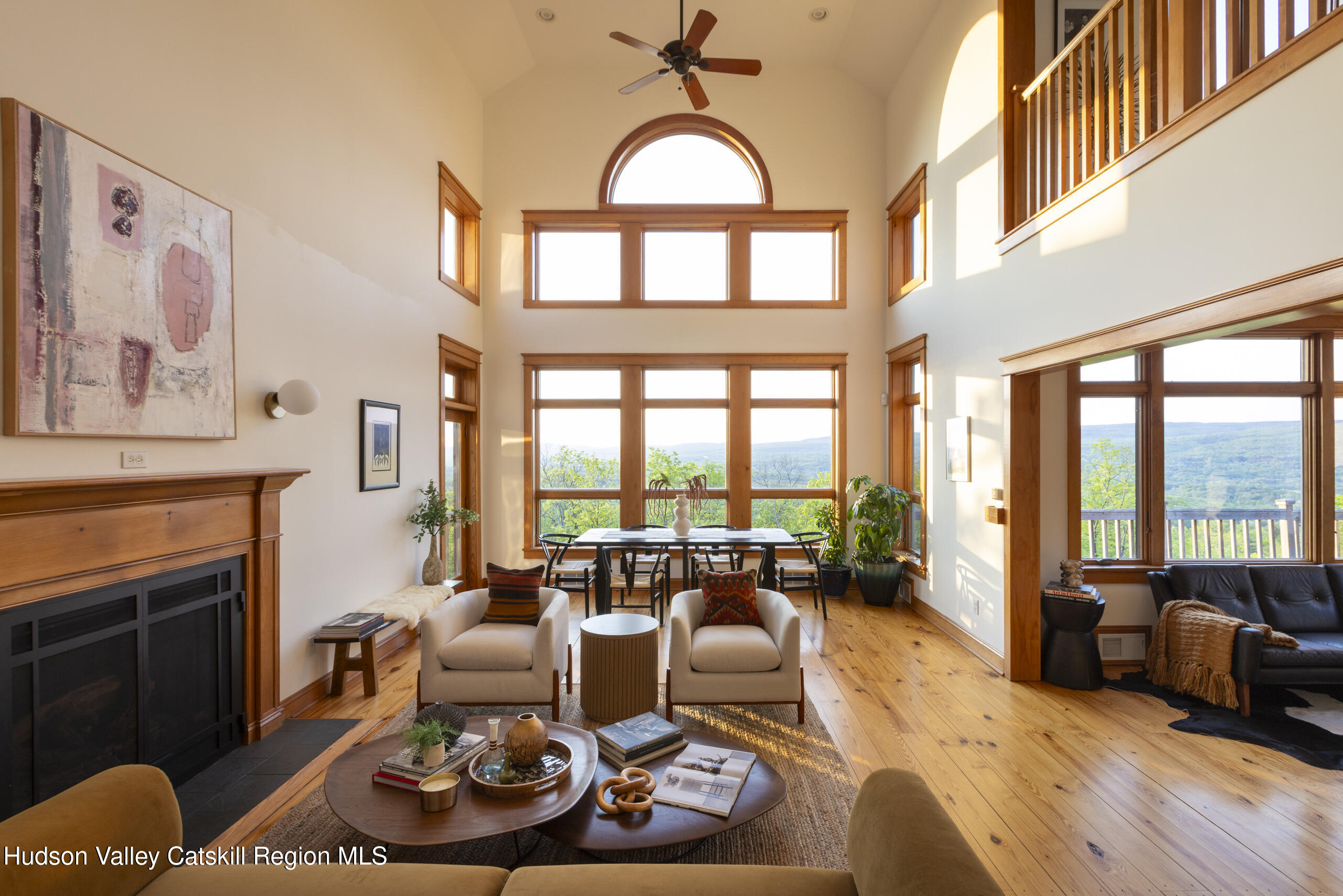 56 Woodland Ridge Road Kerhonkson, NY 12446 - Photo 6 of 31 a living room with furniture fireplace and a large window