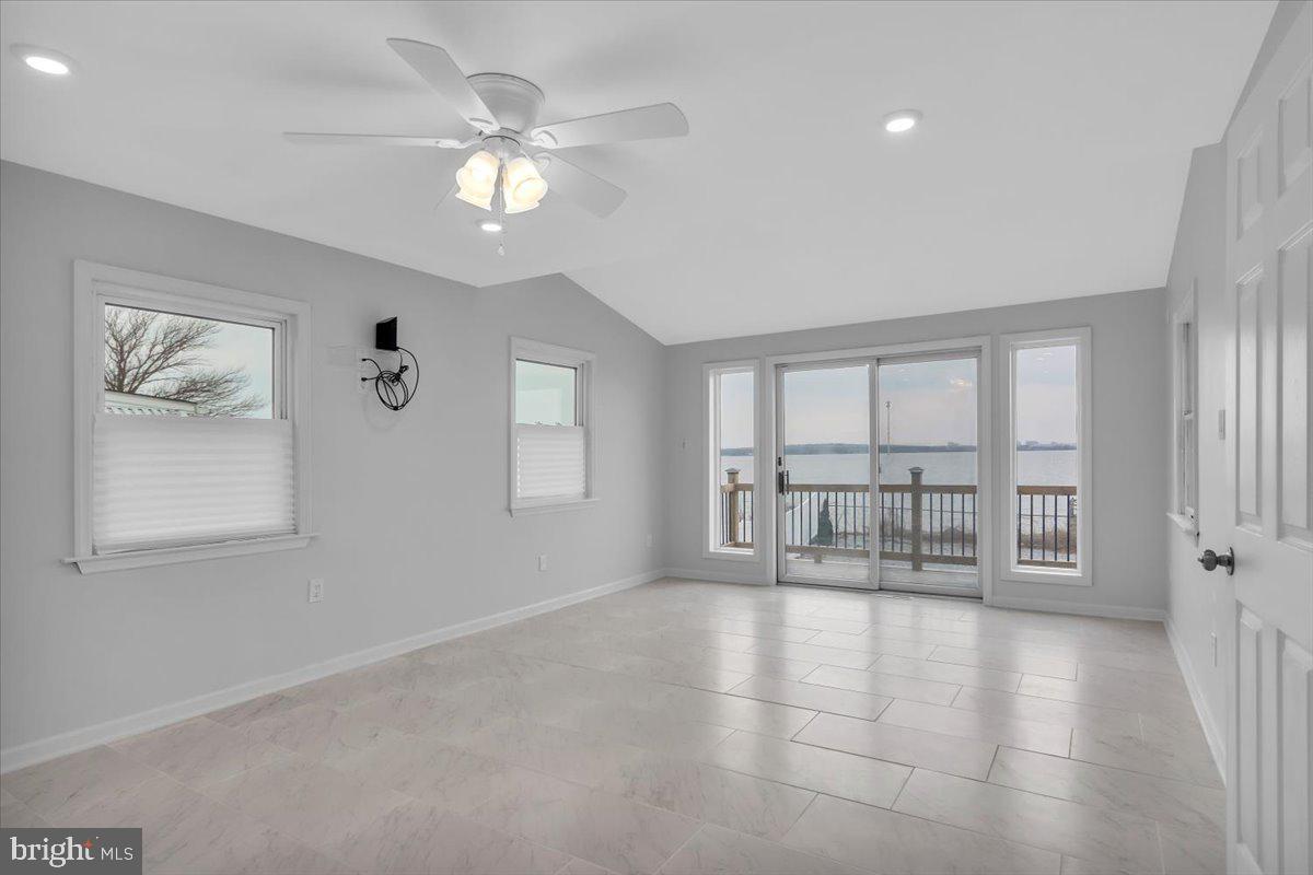 47 Delaware Drive Penns Grove, NJ 08069 - Photo 11 of 38 a view of an empty room with a window