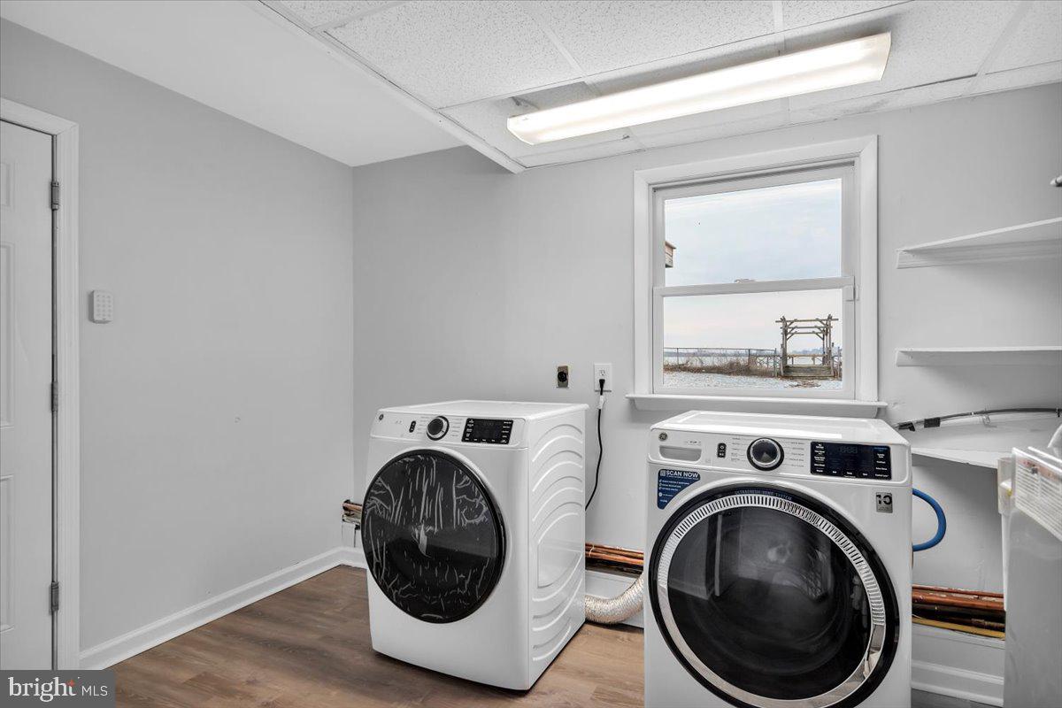 47 Delaware Drive Penns Grove, NJ 08069 - Photo 19 of 38 a utility room with dryer and washer