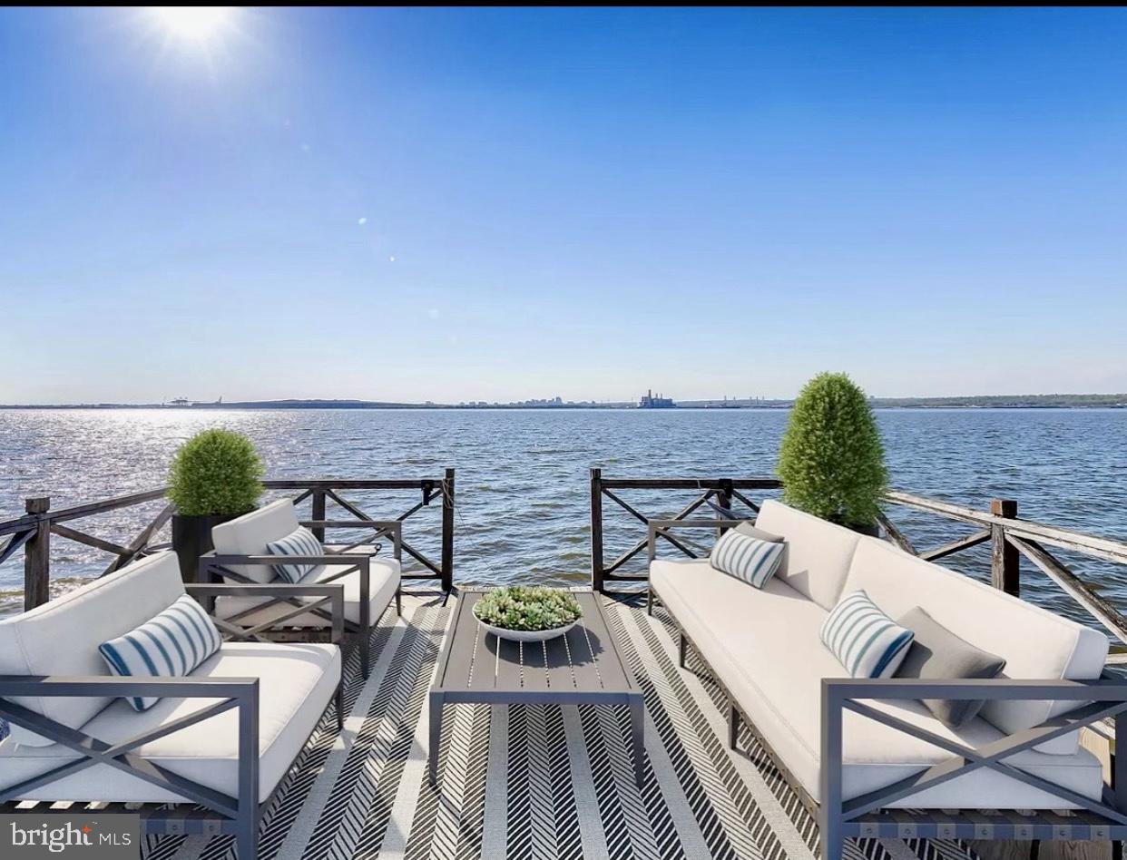 47 Delaware Drive Penns Grove, NJ 08069 - Photo 37 of 38 a view of a terrace with couches and wooden floor