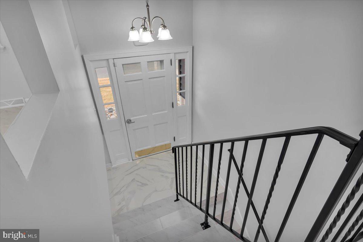 47 Delaware Drive Penns Grove, NJ 08069 - Photo 6 of 38 a view of a hallway with windows