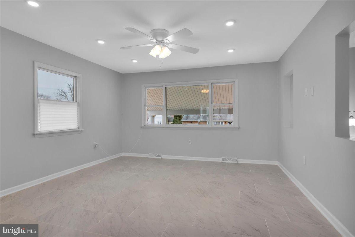 47 Delaware Drive Penns Grove, NJ 08069 - Photo 7 of 38 a view of an empty room with a window