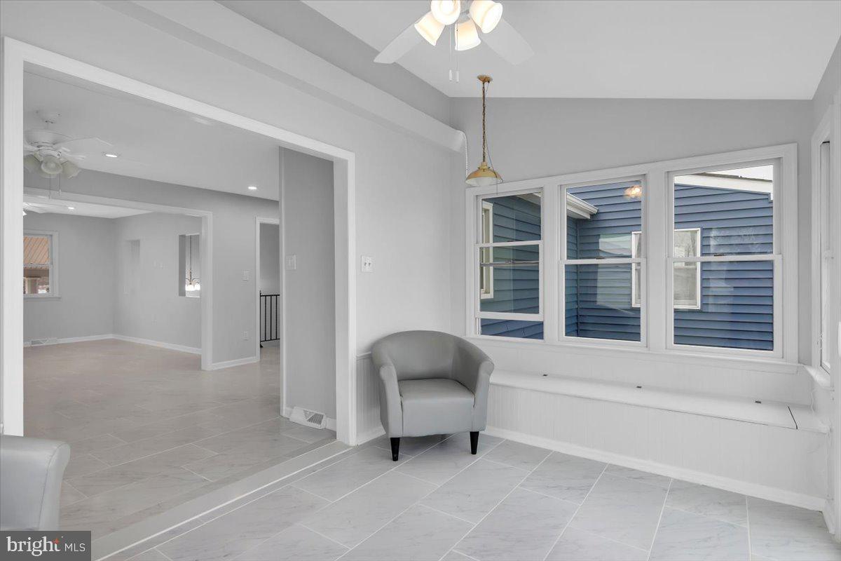 47 Delaware Drive Penns Grove, NJ 08069 - Photo 9 of 38 a living room with furniture and a large window