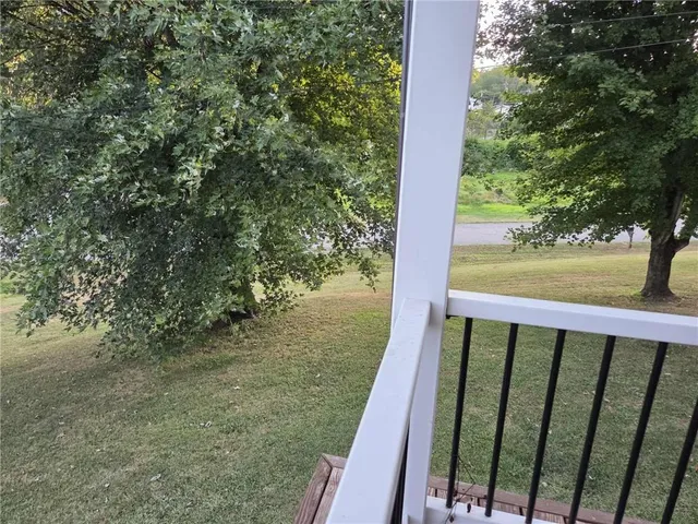 a balcony with an outdoor space