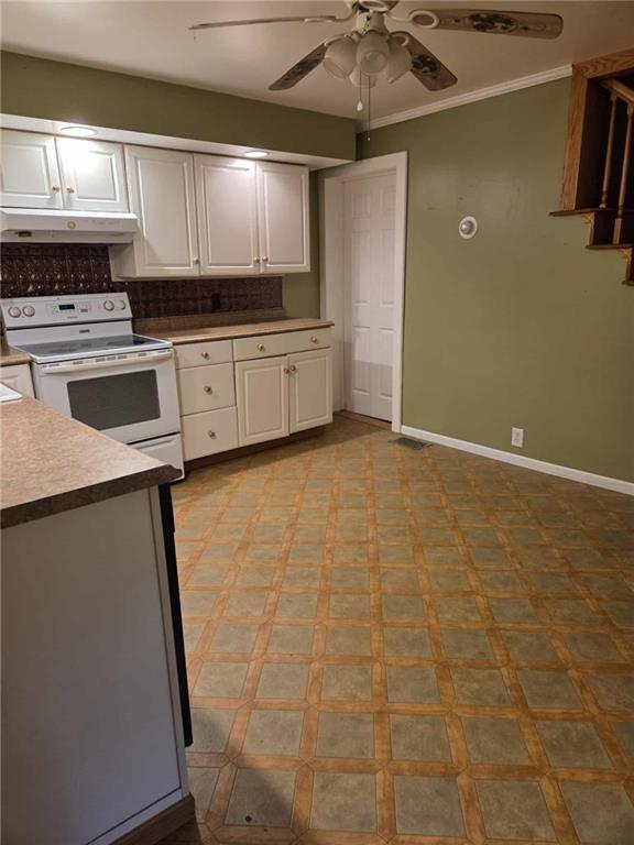 255 Francis Mine State Road Burgettstown, PA 15021 - Photo 21 of 33 a kitchen with granite countertop a sink a stove top oven and cabinetry