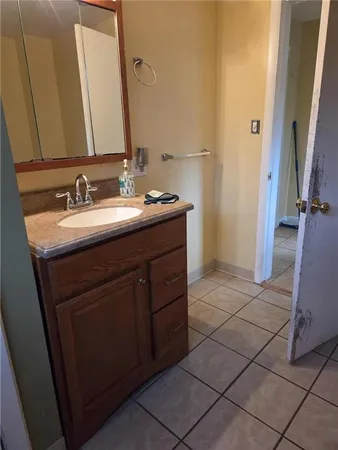 a bathroom with a toilet and a sink