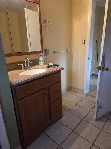 a bathroom with a toilet and a sink