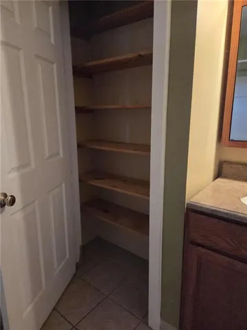 a bathroom with a sink and a shower