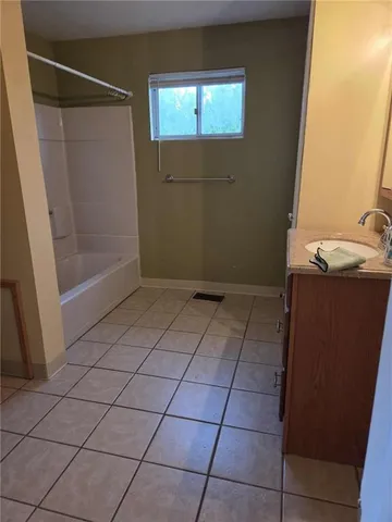 a bathroom with a bathtub